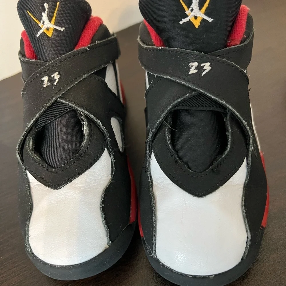 Jordan Black and Red Sneakers with Cross-Straps